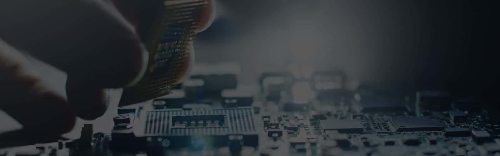 Itque Manageditsolutions Notclear Hand Putting Computer Part On Computer Board | ITQue
